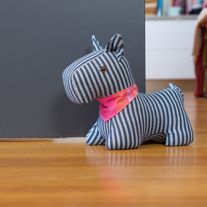 blue striped dog doorstop