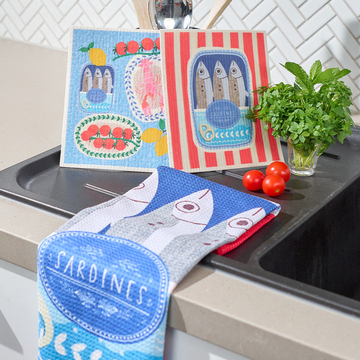 Kitchen towels with fish design on a kitchen counter