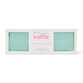 Waffle eye rest pillow packaging with text on a white background