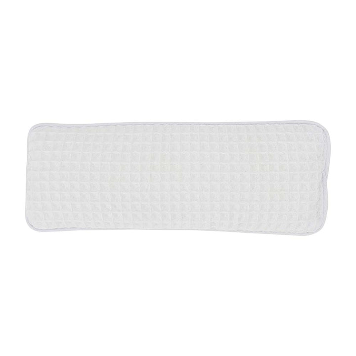 Rectangular white eye rest pillow with textured pattern on a white background