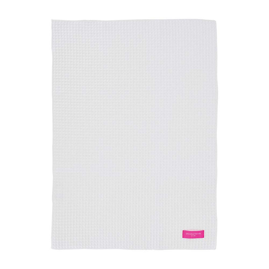 White textured hand towel with a pink logo on a white background
