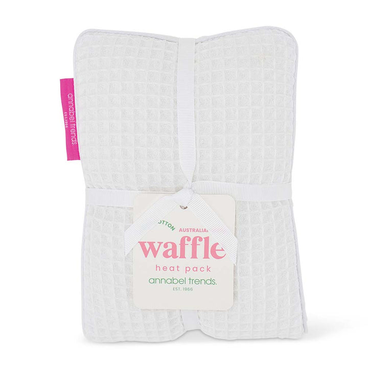 Waffle heat pack with a tag on a white background