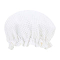 White lace shower cap on a white background
