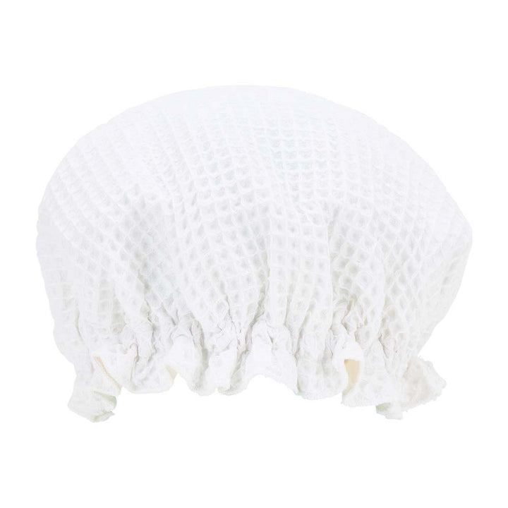 White lace shower cap on a white background