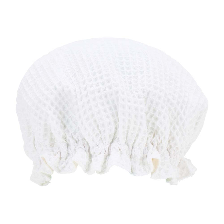 White lace shower cap on a white background