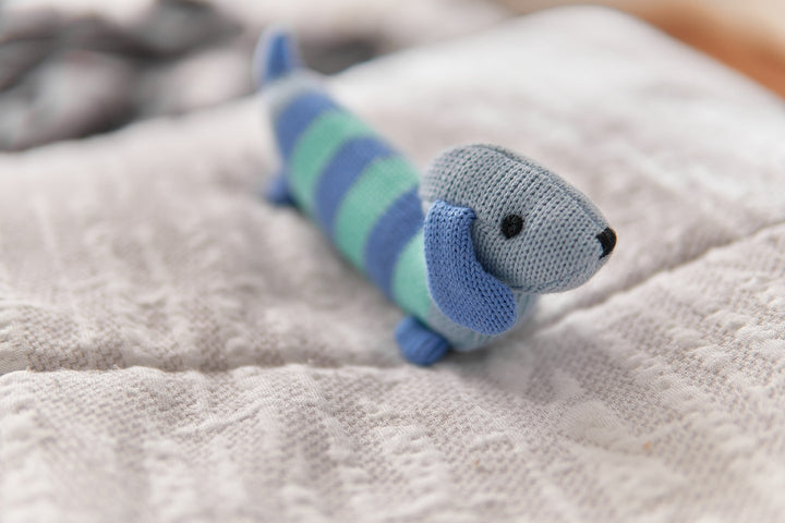 Knitted baby rattle - Dacshund blue