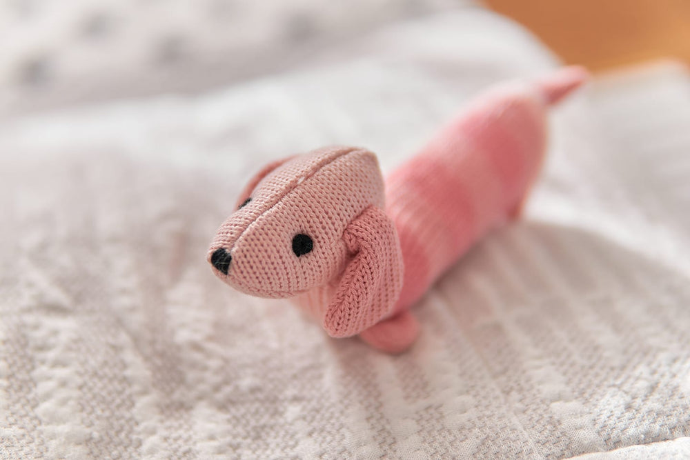 Knitted baby rattle - Dacshund pink