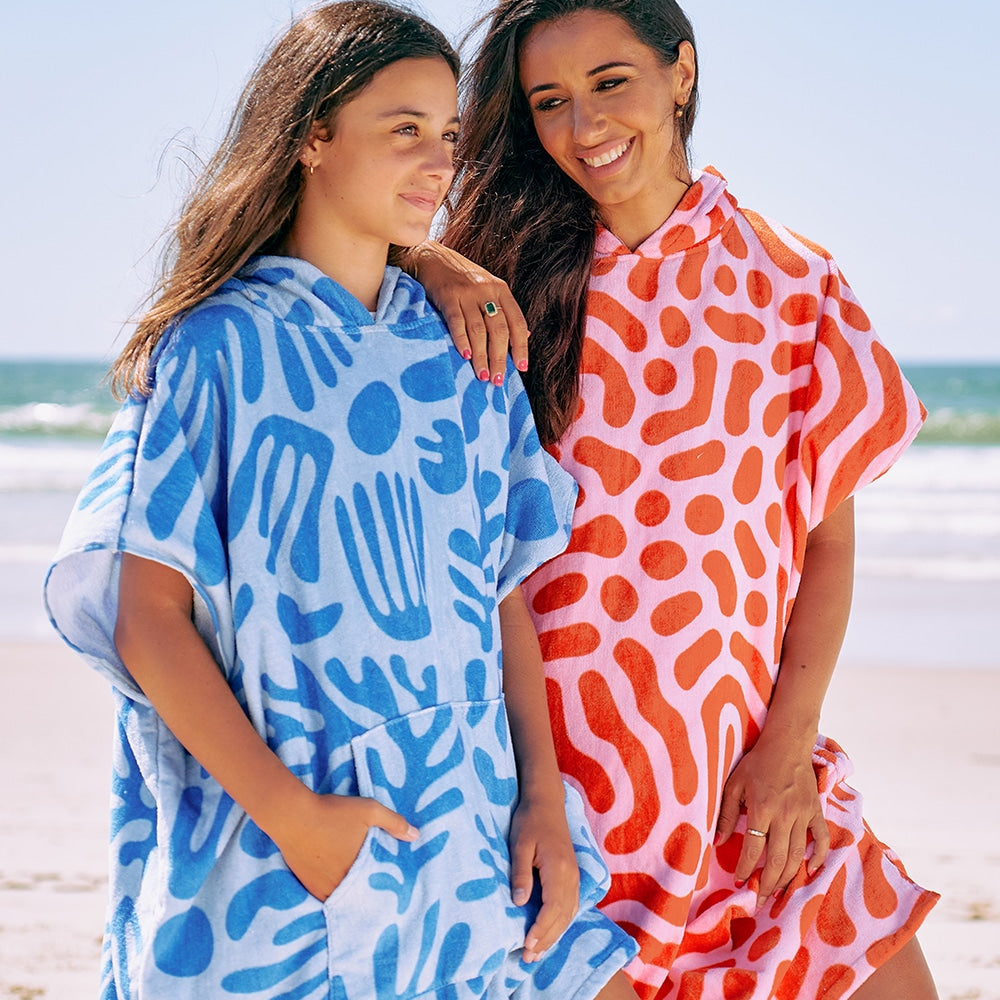  beach poncho in red squiggle and blue coral